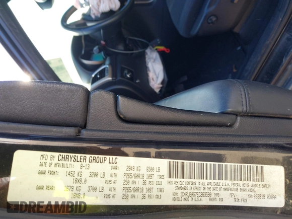 2014 Jeep Grand Cherokee Laredo with VIN 1C4RJEAG7EC263590, listed as a IAAI auction lot 41699106 with 136,581 mi miles and . Bid and sale history available at DreamBid. Image 9.
