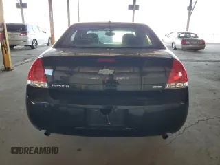 2015 Chevrolet Impala LS with VIN 2G1WA5E37F1158008, listed as a Copart auction lot 61977635 with 106,437 mi miles and Salvage title. Bid and sale history available at DreamBid. Image 6.