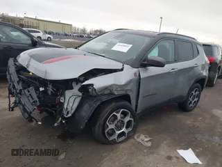 2022 Jeep Compass Trailhawk with VIN 3C4NJDDB3NT128118, listed as a IAAI auction lot 41664845 with 32,660 mi miles and . Bid and sale history available at DreamBid. Image 2.