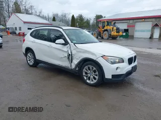 2014 BMW X1 xDrive28i z VIN WBAVL1C52EVY19268, wystawiony jako IAAI lot #41879462 z przebiegiem 156 241 mil mil oraz . Historia ofert i sprzedaży dostępna na DreamBid. Obrazek 1.
