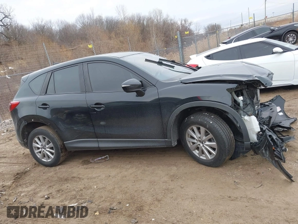 2015 Mazda CX-5 Sport with VIN JM3KE4BY9F0495948, listed as a IAAI auction lot 41501840 with 145,959 mi miles. Bid and sale history available at carsss.com. Image 14.