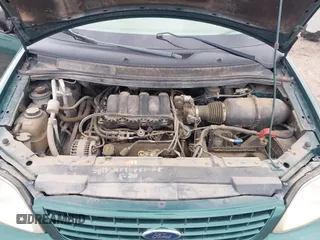 2002 Ford Windstar Sport Standard z VIN 2FMZA57482BB61834, wystawiony jako IAAI lot #41833929 z przebiegiem 209 170 mil mil oraz . Historia ofert i sprzedaży dostępna na DreamBid. Obrazek 10.