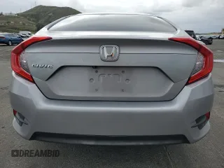 2018 Honda Civic LX with VIN 2HGFC2F56JH586783, listed as a Copart auction lot 48213265 with 103,574 mi miles and Salvage Title. Bid and sale history available at DreamBid. Image 6.