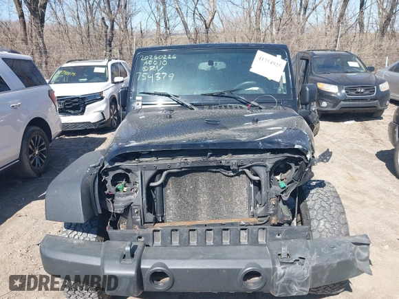 2009 Jeep Wrangler X with VIN 1J4FA24109L754379, listed as a IAAI auction lot 41754925 with 132,500 mi miles and . Bid and sale history available at DreamBid. Image 17.