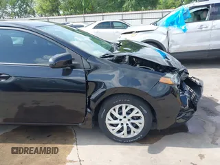 2019 Toyota Corolla L z VIN 5YFBURHE7KP905555, wystawiony jako IAAI lot #41943232 z przebiegiem 83 213 mil mil oraz . Historia ofert i sprzedaży dostępna na DreamBid. Obrazek 18.