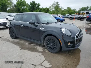 2019 MINI Hardtop Cooper with VIN WMWXP5C55K2H95181, listed as a Copart auction lot 59728085 with 129,249 mi miles and Clean title. Bid and sale history available at DreamBid. Image 4.