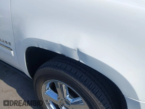2013 Chevrolet Tahoe LTZ with VIN 1GNSKCE04DR374682, listed as a IAAI auction lot 42779526 with 139,533 mi miles and . Bid and sale history available at DreamBid. Image 6.
