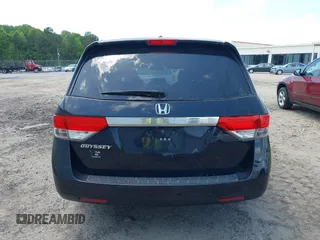 2014 Honda Odyssey EX-L with VIN 5FNRL5H66EB062158, listed as a IAAI auction lot 42072020 with 211,278 mi miles and . Bid and sale history available at carsss.com. Image 16.