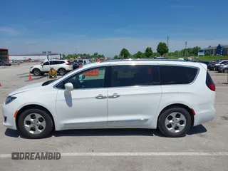 2017 Chrysler Pacifica Touring L Plus with VIN 2C4RC1EG0HR511431, listed as a IAAI auction lot 42242917 with 170,375 mi miles and . Bid and sale history available at DreamBid. Image 14.