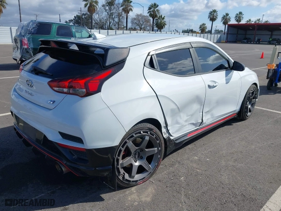 2019 Hyundai Veloster N with VIN KMHT36AH6KU001916, listed as a IAAI auction lot 41577775 with 77,471 mi miles. Bid and sale history available at carsss.com. Image 4.