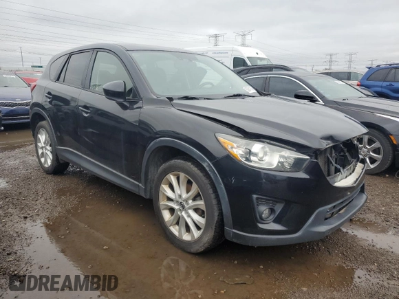 2013 Mazda CX-5 Grand Touring with VIN JM3KE4DE8D0161586, listed as a Copart auction lot 52641145 with 134,290 mi miles and Salvage Title. Bid and sale history available at carsss.com. Image 4.