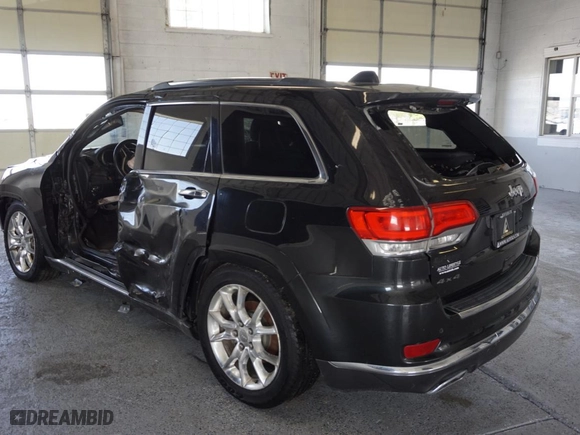 2014 Jeep Grand Cherokee Summit with VIN 1C4RJFJG5EC340768, listed as a Copart auction lot 76582324 with 119,377 mi miles and Salvage Title. Bid and sale history available at carsss.com. Image 4.