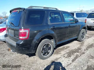 2009 Ford Escape XLT with VIN 1FMCU93G59KB55025, listed as a IAAI auction lot 41756362 with 999,999 mi miles. Bid and sale history available at carsss.com. Image 4.