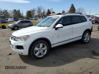 2012 Volkswagen Touareg с VIN WVGEG9BP1CD007581, выставлен на аукционе Copart как лот 47958355 с пробегом 79 649 миль миль и Списание • Salvage title. История ставок и продаж доступна на DreamBid. Изображение 1.