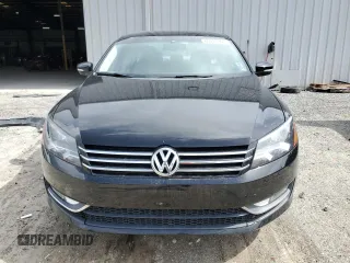 2014 Volkswagen Passat SE with VIN 1VWBN7A35EC094262, listed as a Copart auction lot 60287965 with 71,081 mi miles and Salvage title. Bid and sale history available at DreamBid. Image 5.