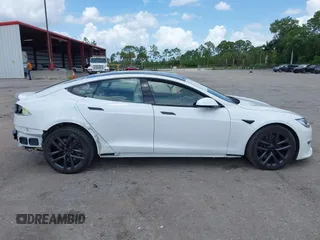 2021 Tesla Model S Plaid с VIN 5YJSA1E67MF436814, выставлен на аукционе IAAI как лот 42499058 с пробегом 21 401 миль миль и . История ставок и продаж доступна на DreamBid. Изображение 14.