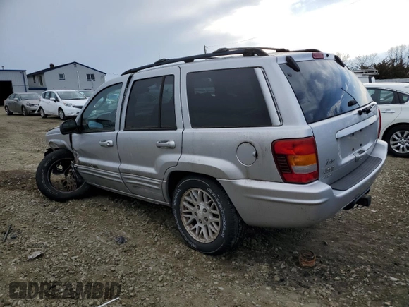 2004 Jeep Grand Cherokee Limited with VIN 1J4GW58N64C174387, listed as a Copart auction lot 43539585 with 138,433 mi miles and Salvage title. Bid and sale history available at DreamBid. Image 2.