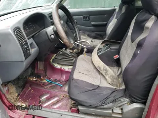 1995 Nissan Frontier SE z VIN 1N6HD16Y1SC324955, wystawiony jako Copart lot #42983295 z przebiegiem 266 320 mil mil oraz Szkoda całkowita • Salvage title. Historia ofert i sprzedaży dostępna na DreamBid. Obrazek 7.