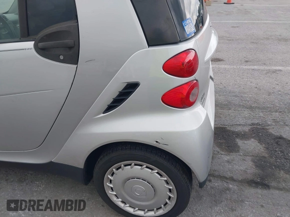 2009 Smart fortwo Pure with VIN WMEEJ31X69K317204, listed as a IAAI auction lot 42779603 with 159,179 mi miles and . Bid and sale history available at DreamBid. Image 6.