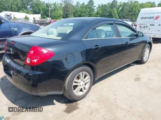 2005 Pontiac G6 with VIN 1G2ZG528554140262, listed as a IAAI auction lot 42592728 with 155,397 mi miles and . Bid and sale history available at DreamBid. Image 4.