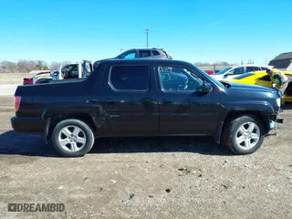 2011 Honda Ridgeline RTL with VIN 5FPYK1F53BB008207, listed as a IAAI auction lot 41745089 with 160,170 mi miles. Bid and sale history available at carsss.com. Image 13.