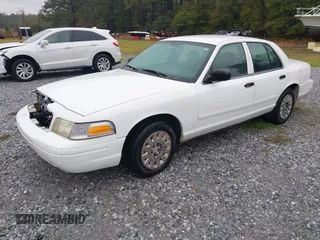 2005 Ford Police Interceptor z VIN 2FAFP71W25X139210, wystawiony jako IAAI lot #41609177 z przebiegiem 114 755 mil mil oraz . Historia ofert i sprzedaży dostępna na DreamBid. Obrazek 2.