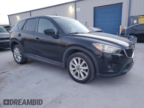 2014 Mazda CX-5 Grand Touring with VIN JM3KE4DY5E0386043, listed as a Copart auction lot 48866995 with 183,626 mi miles and Salvage Title. Bid and sale history available at DreamBid. Image 4.