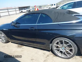 2012 BMW 6 Series 650i with VIN WBALZ3C53CC397604, listed as a IAAI auction lot 41881996 with 96,175 mi miles and . Bid and sale history available at carsss.com. Image 14.