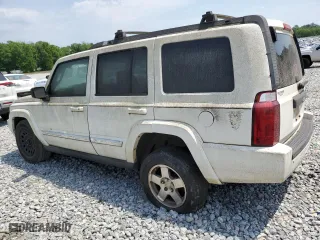 2010 Jeep Commander Sport with VIN 1J4RH4GK0AC103539, listed as a Copart auction lot 54136675 with 243,238 mi miles and Clean Title. Bid and sale history available at carsss.com. Image 2.