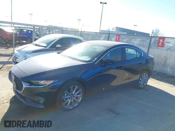 2021 Mazda 3 Select with VIN 3MZBPBBL8MM250013, listed as a IAAI auction lot 41430402 with 43,819 mi miles and . Bid and sale history available at carsss.com. Image 17.