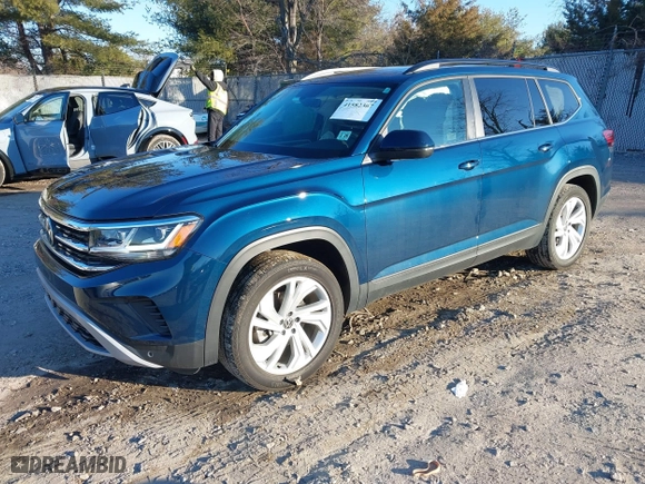 2021 Volkswagen Atlas 3.6L V6 SE w/Technology with VIN 1V2KR2CA6MC564513, listed as a IAAI auction lot 41582367 with 39,337 mi miles. Bid and sale history available at carsss.com. Image 2.