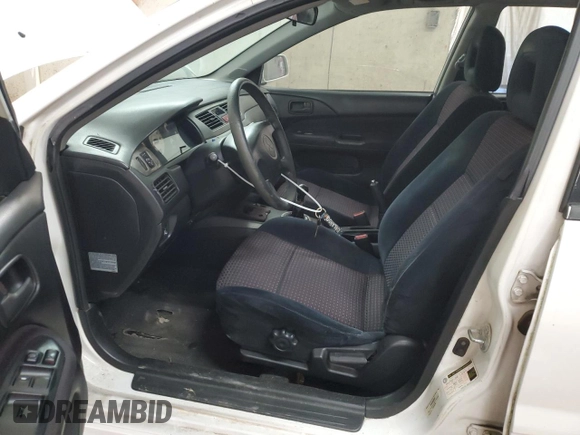 2004 Mitsubishi Lancer with VIN JA3AJ66F64U029144, listed as a Copart auction lot 77437234 with 158,049 mi miles and Salvage Title. Bid and sale history available at DreamBid. Image 7.