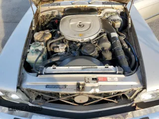 1987 Mercedes-Benz 560 560SL with VIN WDBBA48D9HA070265, listed as a Copart auction lot 77411844 with 120,884 mi miles and Salvage Title. Bid and sale history available at carsss.com. Image 11.