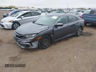 2020 Honda Civic LX with VIN 2HGFC2F63LH567698, listed as a IAAI auction lot 42354886 with 70,977 mi miles and . Bid and sale history available at DreamBid. Image 2.