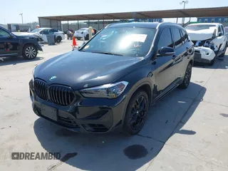 2021 BMW X1 sDrive28i with VIN WBXJG7C07M3M65841, listed as a IAAI auction lot 41877032 with 79,817 mi miles and . Bid and sale history available at DreamBid. Image 2.