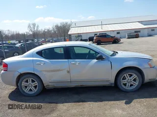 2008 Dodge Avenger SXT with VIN 1B3LC56K28N684317, listed as a IAAI auction lot 41988986 with 241,325 mi miles and . Bid and sale history available at DreamBid. Image 13.