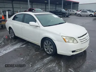 2005 Toyota Avalon XL with VIN 4T1BK36B65U004076, listed as a IAAI auction lot 41570041 with 293,420 mi miles and . Bid and sale history available at carsss.com. Image 1.