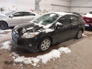2012 Ford Focus SE with VIN 1FAHP3F2XCL414212, listed as a IAAI auction lot 41472826 with 162,025 mi miles. Bid and sale history available at carsss.com. Image 2.