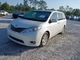 2015 Toyota Sienna XLE with VIN 5TDYK3DC5FS534913, listed as a IAAI auction lot 42052427 with 105,046 mi miles. Bid and sale history available at carsss.com. Image 2.