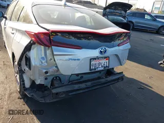 2022 Toyota Prius LE z VIN JTDKAMFP8N3211485, wystawiony jako IAAI lot #42515220 z przebiegiem 23 875 mil mil oraz . Historia ofert i sprzedaży dostępna na DreamBid. Obrazek 6.