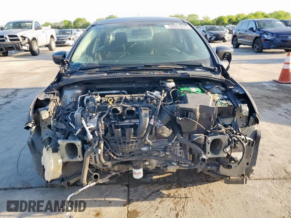 2018 Ford Focus SE z VIN 1FADP3F2XJL256272, wystawiony jako Copart lot #52651675 z przebiegiem 37 897 mil mil oraz Szkody całkowita. Historia ofert i sprzedaży dostępna na DreamBid. Obrazek 5.