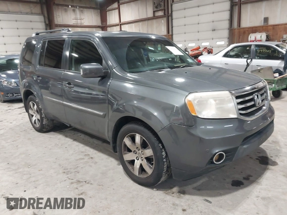 2012 Honda Pilot Touring with VIN 5FNYF4H99CB052034, listed as a IAAI auction lot 42023430 with 137,428 mi miles. Bid and sale history available at carsss.com. Image 1.