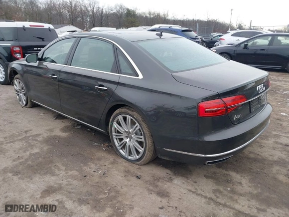 2016 Audi A8 L 3.0T with VIN WAU34AFD7GN008348, listed as a IAAI auction lot 41352817 with 105,762 mi miles. Bid and sale history available at carsss.com. Image 3.