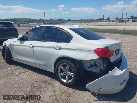 2014 BMW 3 Series 320i with VIN WBA3B1C51EK131063, listed as a IAAI auction lot 42043086 with 92,306 mi miles. Bid and sale history available at carsss.com. Image 3.