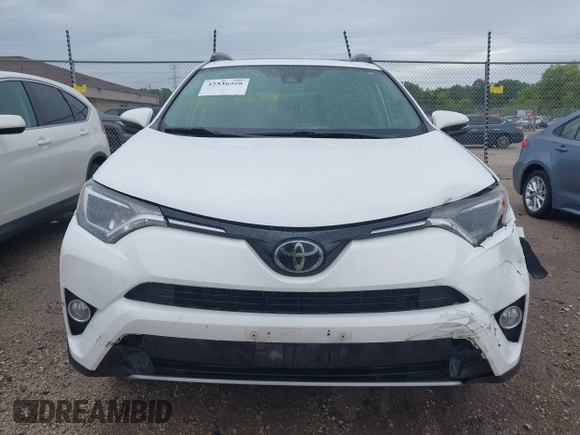 2018 Toyota RAV4 XLE with VIN 2T3WFREV4JW469929, listed as a IAAI auction lot 42536958 with 82,443 mi miles and . Bid and sale history available at DreamBid. Image 12.