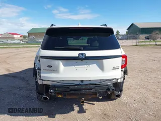 2019 Honda Passport Elite z VIN 5FNYF8H0XKB001472, wystawiony jako IAAI lot #42143890 z przebiegiem 98 119 mil mil oraz . Historia ofert i sprzedaży dostępna na DreamBid. Obrazek 17.