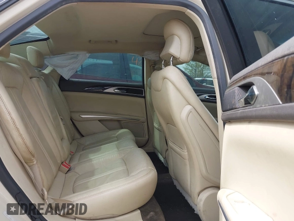 2014 Lincoln MKZ z VIN 3LN6L2JK7ER821385, wystawiony jako IAAI lot #42114154 z przebiegiem 141 480 mil mil oraz . Historia ofert i sprzedaży dostępna na DreamBid. Obrazek 8.