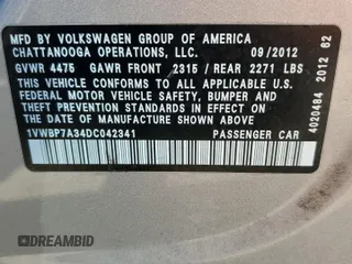 2013 Volkswagen Passat SE with VIN 1VWBP7A34DC042341, listed as a Copart auction lot 66894324 with 200,944 mi miles and Salvage title. Bid and sale history available at DreamBid. Image 12.