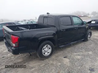 2023 Toyota Tacoma SR with VIN 3TMCZ5AN3PM633643, listed as a IAAI auction lot 41787399 with 4,313 mi miles and . Bid and sale history available at DreamBid. Image 4.