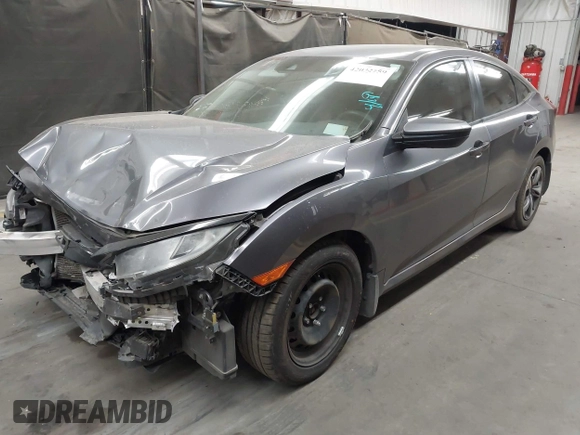 2020 Honda Civic LX with VIN 19XFC2F67LE006057, listed as a IAAI auction lot 42032759 with 119,319 mi miles and . Bid and sale history available at DreamBid. Image 2.